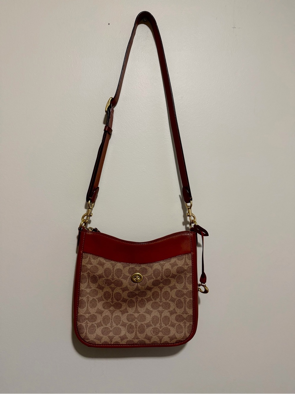 Coach Brown Signature Canvas Crossbody with Red Leather Trim